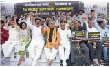 Aap calls protest over cm house renovation a ‘farce’  bjp hits back