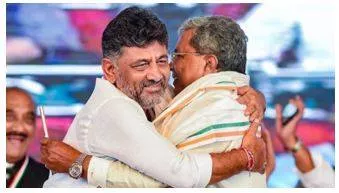'power sharing means…'  congress after naming siddaramaiah as k'taka cm  shivakumar as deputy