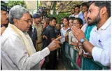 Siddaramaiah keeps finance  shivakumar gets irrigation