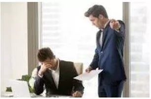 Criticized - Indicate the faults of (someone or something) in a disapproving way.