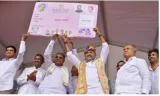 Congress in karnataka rolls out free bus travel scheme for women