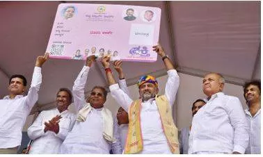Congress in karnataka rolls out free bus travel scheme for women