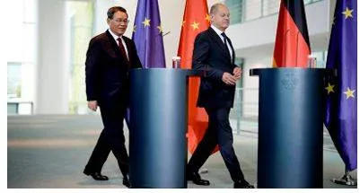 Chinese premier holds talks with german chancellor