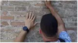 Hunt on for man who carved girlfriend's name on italy's iconic colosseum