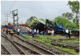 Goods train overshoots signal  hits a maintenance train and derails in bengal