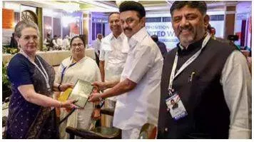 Sonia  mamata share moments together during opposition meet in bengaluru
