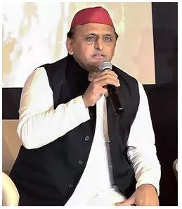 Akhilesh sees red after police book sp worker for tomato stunt