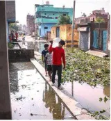 Books lost to the flood  children on the verge of dropping out of school