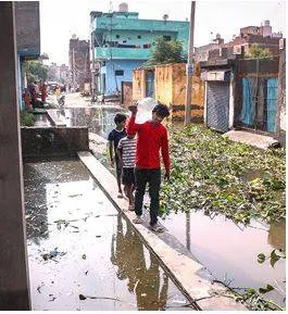 Books lost to the flood  children on the verge of dropping out of school