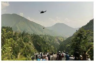 Rescuers save all eight people from cable car dangling above canyon in pakistan