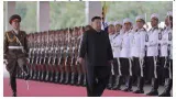 Who is accompanying north korea's kim on trip to russia 