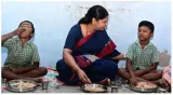 Sc woman cook row in t n  school  kanimozhi  collector have breakfast with children