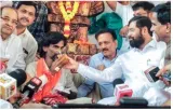 Maratha quota activist ends fast after cm shinde calls on him  vows to fulfil demand