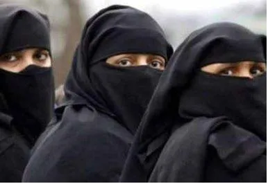 Swiss parliament approves ban on burqas  sets fine for violators