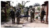 Israeli village near gaza border lies in ruin  filled with bodies of residents & militants