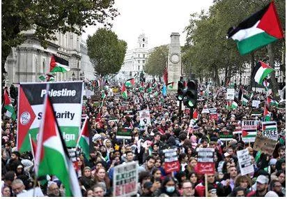 Pro palestinian protesters hold march in u k  as gaza war enters third week