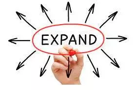 Expanded - To become or to make something bigger.