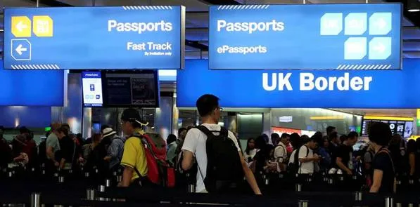 U k  tightens immigration rules to curb record high migrant numbers