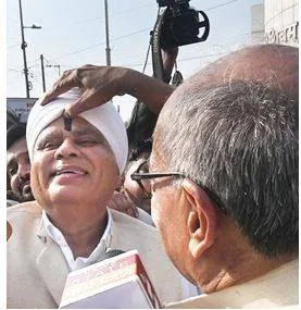 Cong  mla keeps poll promise in m p   ‘blackens’ face