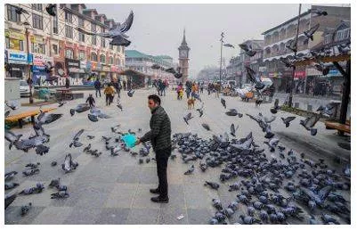 Peaceful kashmir watches verdict with bated breath