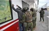 Ecuador says 178 prison guards  staff members are held hostage by gangs