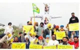 Farmers stage stir against wto  take out tractor rally