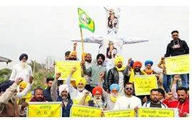 Farmers stage stir against wto  take out tractor rally