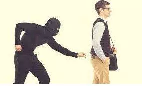 Snatching - Quickly seize (something) in a rude or eager way.