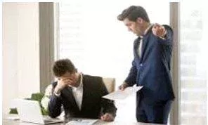 Criticized - Indicate the faults of (someone or something) in a disapproving way.