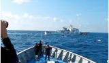 Chinese coast guard tries to block filipino vessels in south china sea