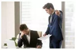 Criticized - Indicate the faults of (someone or something) in a disapproving way.