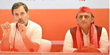 Rahul and akhilesh slam modi for graft in poll bond scheme