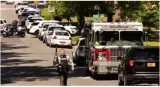 Four police officers killed and four others injured in charlotte  north carolina in a gun battle with a fugitive