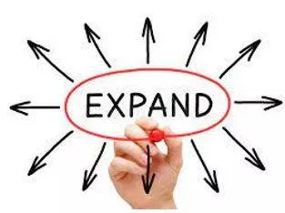 Expanded - To become or to make something bigger.