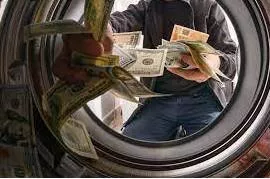 Laundering - Conceal the origins of (money obtained illegally)