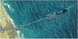 First aid shipment driven across a new pier into the gaza strip  says u s  military