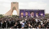 Huge crowds gather in iran’s capital for president’s funeral