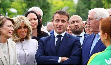 In berlin for state visit  macron makes plea to defend democracy