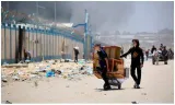 11 killed as israel strikes targets across gaza  troops push into central rafah