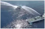 Chinese forces seize two philippines boats in disputed shoal