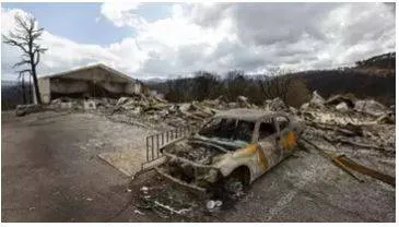 Team combs fire ravaged new mexico community for remains of the missing
