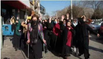 At un meeting  taliban asked to include women into public life