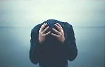 Desperately - Feeling or showing a hopeless sense that a situation is so bad as to be impossible to deal with.