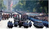 Amid present political uncertainty  france celebrates its national day