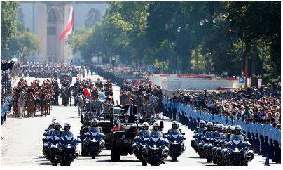 Amid present political uncertainty  france celebrates its national day