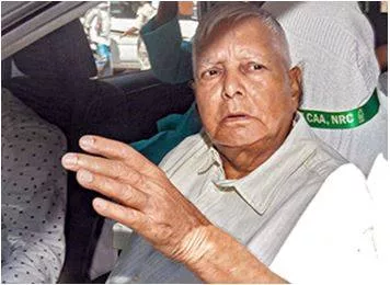 Lalu accuses bihar cm of ‘completely surrendering’ to bjp on special status