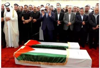 Slain hamas chief buried in qatar amid vows of revenge