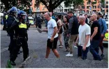 U k  grapples with worst riots in 13 years spurred by far right