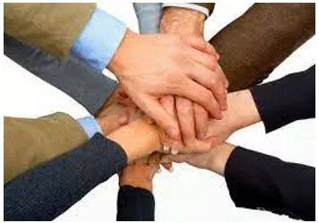Coalition - A temporary alliance for combined action, especially of political parties forming a government. (गठबंधन)