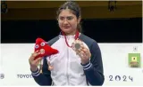 Bronze for rubina as india wins fourth medal in shooting